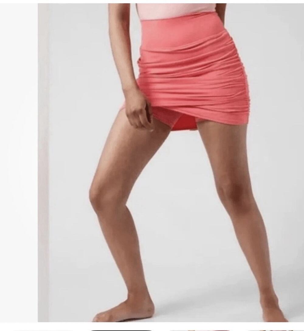 Athleta Transcend Skort. Coral petal pink color. Size XXS